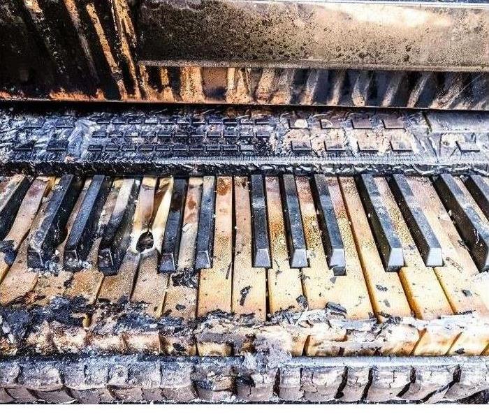 Piano burned from a house fire